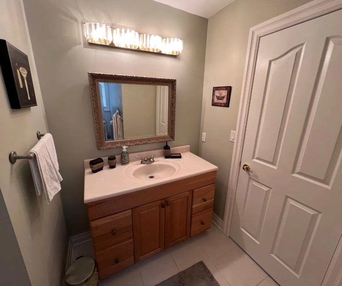 Elegant bathroom vanity with mirror and lighting
